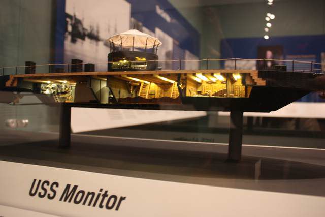'The Age of Iron and Steam' room features a model of the USS Monitor with a cross section view of the cabins below.